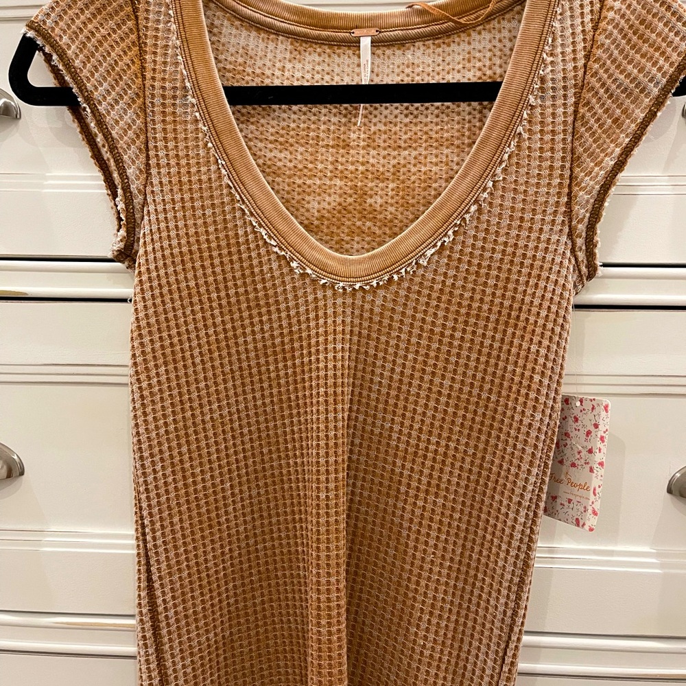 Free People blouse, stretch material, very pretty color.. NWT